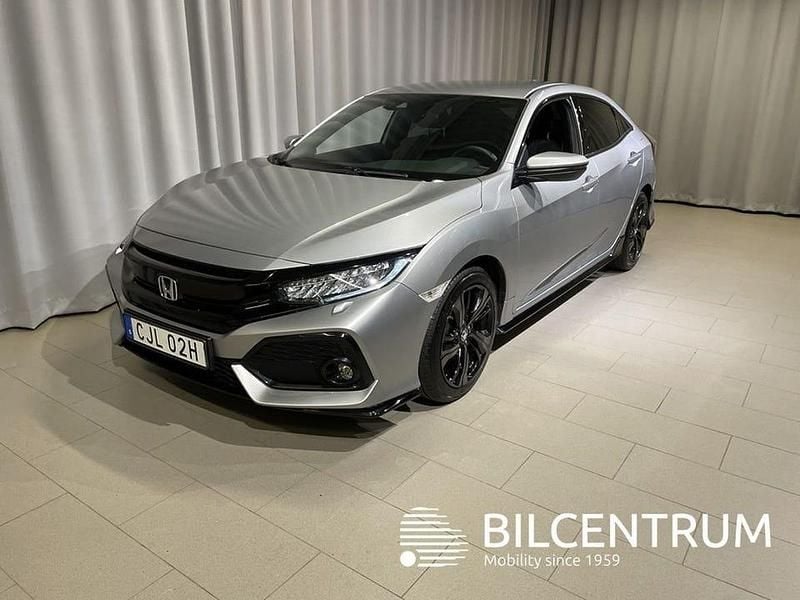 Silver Begagnad 2018 Honda Civic Sport Sedan | 184 900 kr (Marknadspris) - Bild 1/4