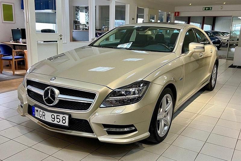 Ljusbrun Begagnad 2011 Mercedes CLS350 AMG Sportkupé | 299 800 kr (Marknadspris) - Bild 1/4
