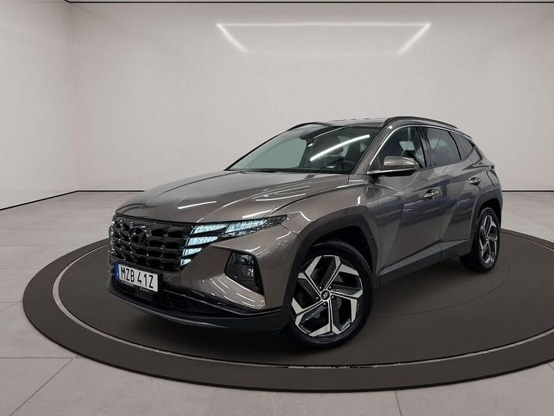 Brun Begagnad 2022 Hyundai Tucson Advanced SUV | 304 500 kr (Marknadspris) - Bild 1/3