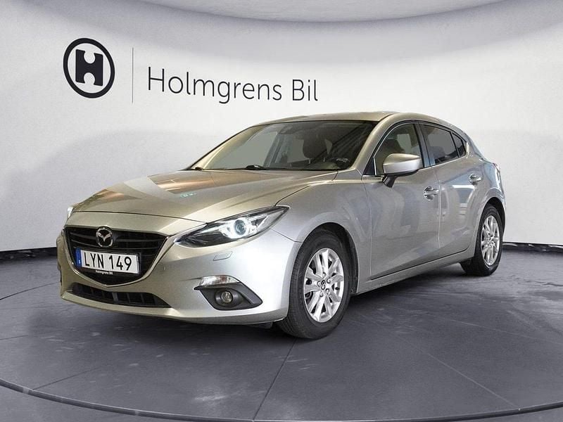 Grå Begagnad 2015 Mazda 3 Inclusive Halvkombi | 128 900 kr (Marknadspris) - Bild 1/4