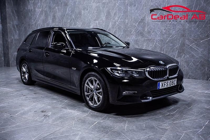 Begagnad BMW 330e Sport Line 184 HK (135 kW) 2021 Svart Kombi
