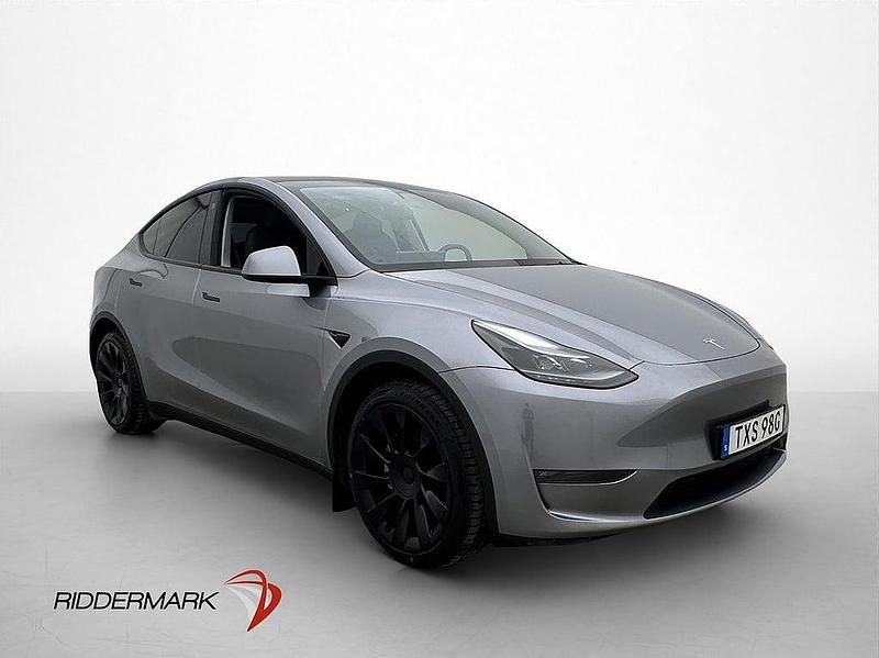 Begagnad Tesla Model Y Long Range AWD 378 kW (514 HK) 2023 Grå SUV