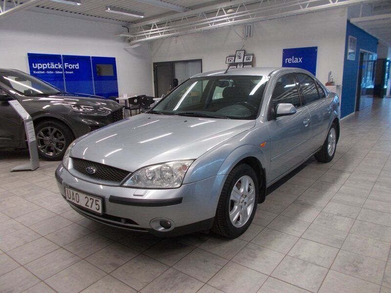 Silver (silver met) Begagnad 2003 Ford Mondeo Ghia Sedan | 24 900 kr (Marknadspris) - Bild 1/4