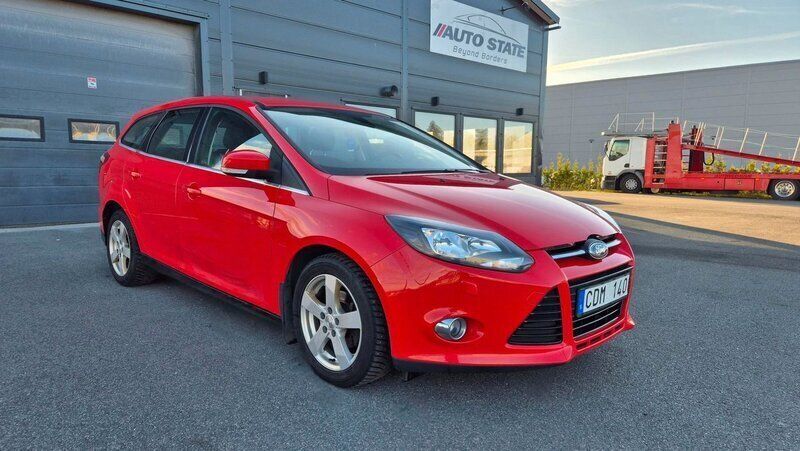 Röd Begagnad 2012 Ford Focus Titanium Kombi | 64 900 kr (Marknadspris) - Bild 1/4
