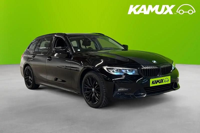 Svart Begagnad 2021 BMW 320 Kombi | 244 900 kr (Lite dyr) - Bild 1/4