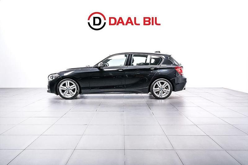 Svart Begagnad 2013 BMW 120 M Sport Halvkombi | 129 700 kr (Marknadspris) - Bild 1/4