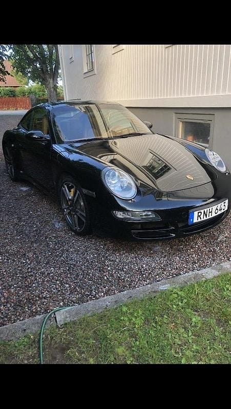 Grön Begagnad 2007 Porsche 911 Carrera 4S Sportkupé | 650 000 kr (Dyr) - Bild 1/4