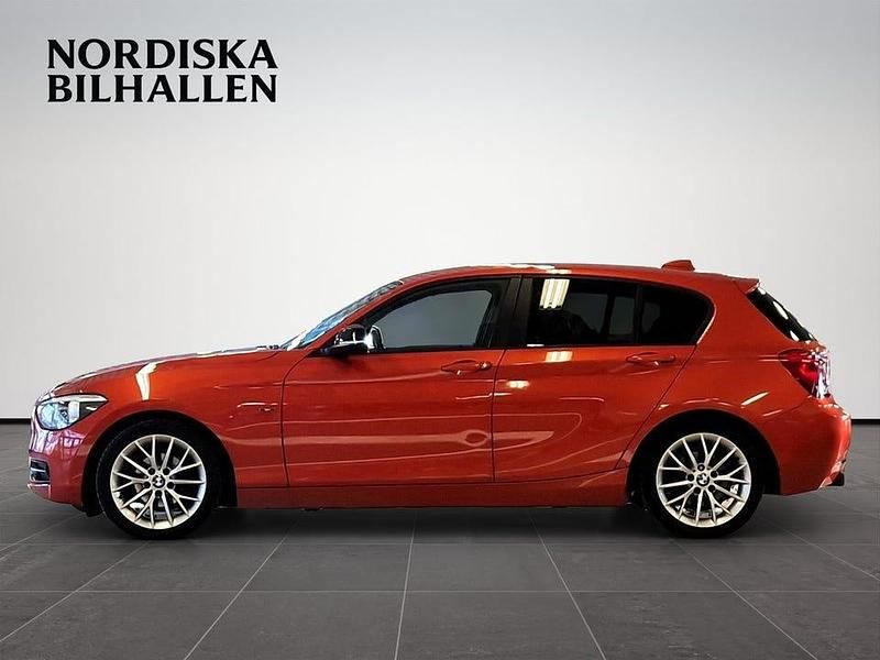 Begagnad BMW 118 Sport Line 143 HK (105 kW) 2012 Orange Halvkombi