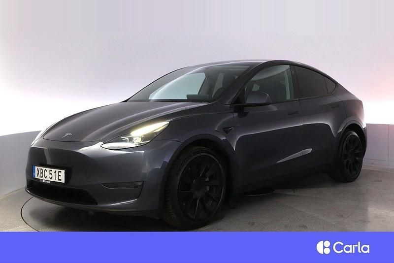 Grå Begagnad 2022 Tesla Model Y Long Range SUV | 366 900 kr (Superpris) - Bild 1/4