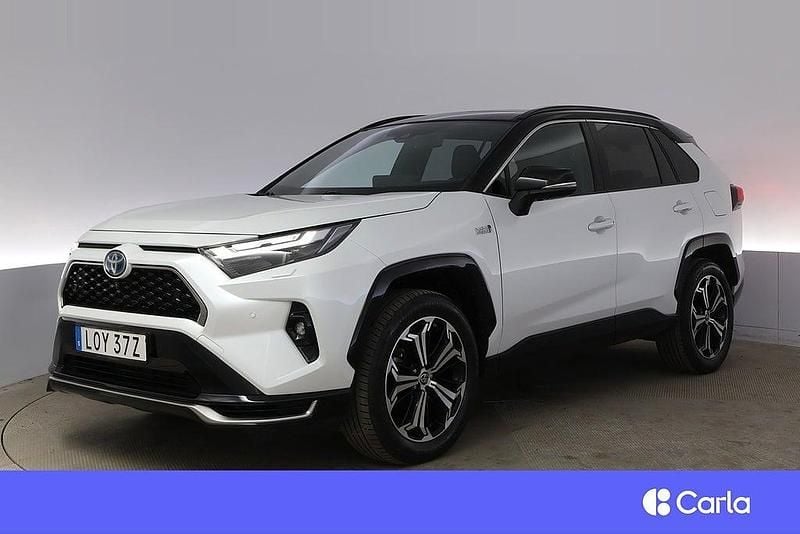 Vit Begagnad 2023 Toyota RAV4 Hybrid Premium SUV | 514 900 kr - Bild 1/4