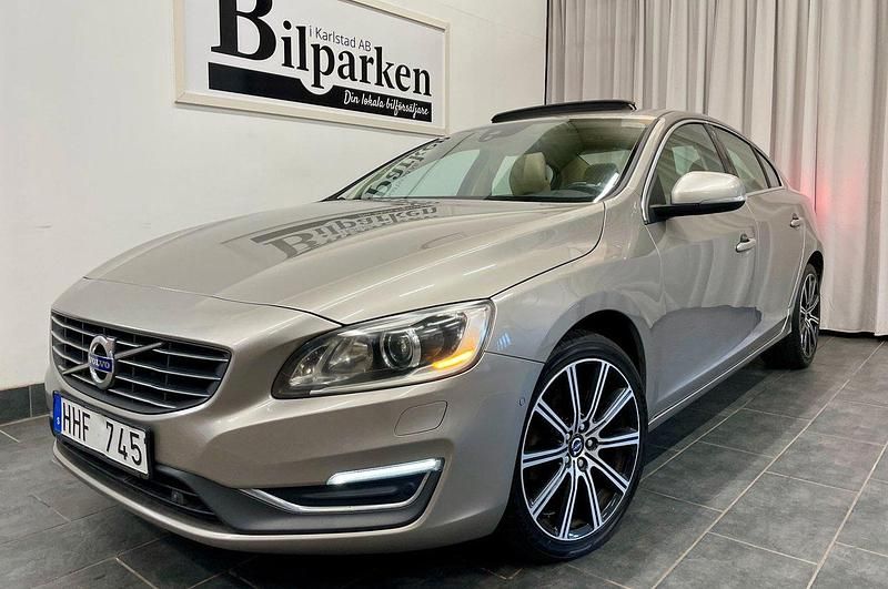 Ljusbrun Begagnad 2013 Volvo S60 Summum Sedan | 119 900 kr (Marknadspris) - Bild 1/3