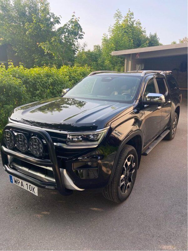 Svart Begagnad 2023 VW Amarok Style Pickup | 695 000 kr (Bra pris) - Bild 1/4