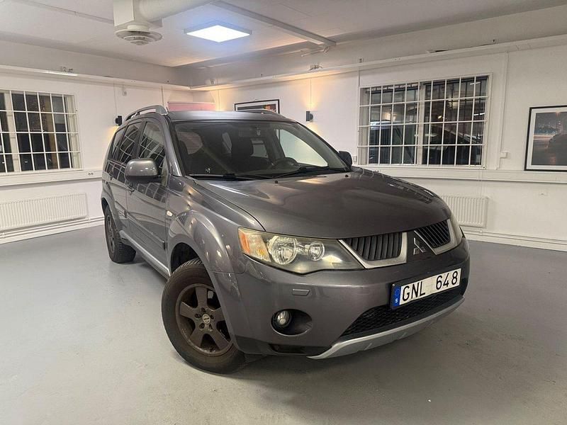 Mörkgrå Begagnad 2007 Mitsubishi Outlander SUV | 39 900 kr (Marknadspris) - Bild 1/4