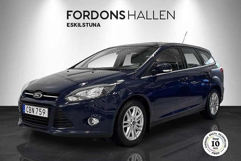Blå Begagnad 2014 Ford Focus Titanium Kombi | 69 900 kr (Lite dyr) - Bild 1/4