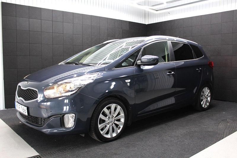Blå Begagnad 2016 Kia Carens Minibuss | 134 000 kr (Marknadspris) - Bild 1/4