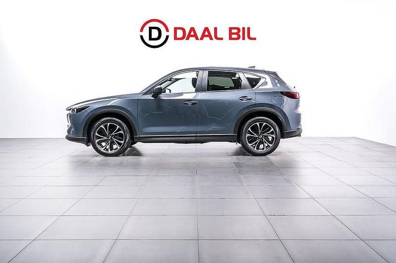 Grå Begagnad 2021 Mazda CX-5 SUV | 299 700 kr (Lite dyr) - Bild 1/4