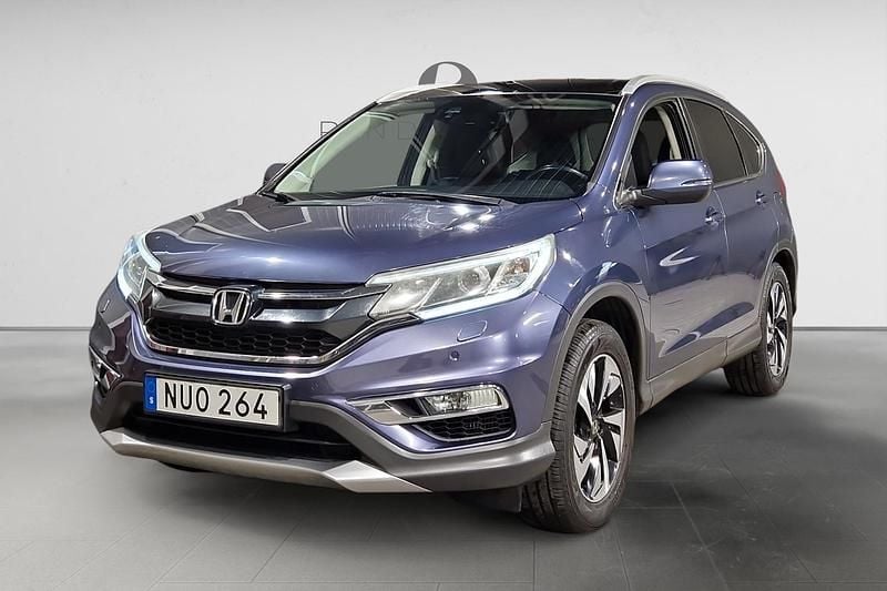 Blå Begagnad 2015 Honda CR-V Executive SUV | 159 900 kr (Marknadspris) - Bild 1/3
