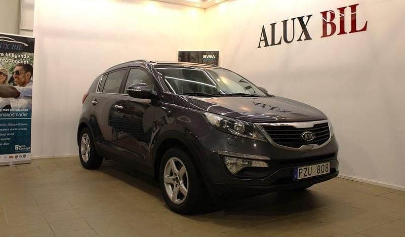 Grå Begagnad 2012 Kia Sportage Comfort SUV | 74 900 kr (Marknadspris) - Bild 1/4