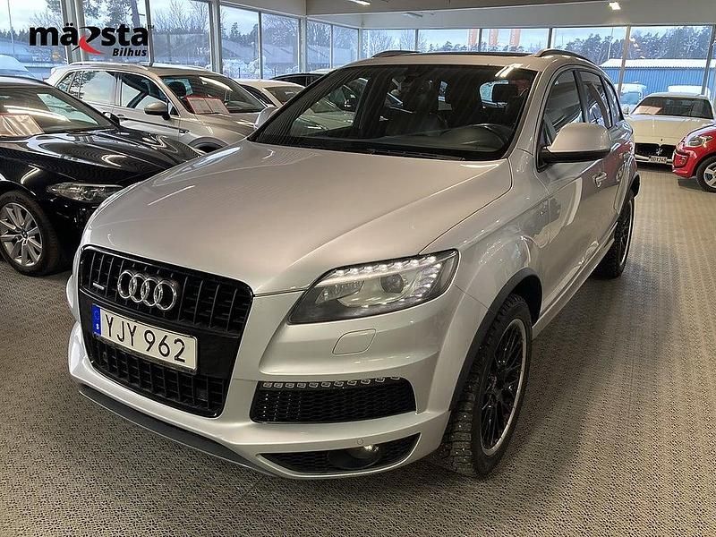 Silver Begagnad 2013 Audi Q7 Business SUV | 184 900 kr (Marknadspris) - Bild 1/4