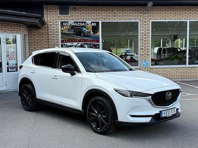 Snowflake white pearl Begagnad 2021 Mazda CX-5 Edition SUV | 239 500 kr (Marknadspris) - Bild 1/4