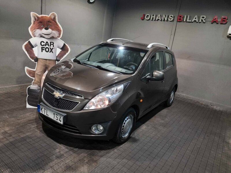 Brun Begagnad 2010 Chevrolet Spark Halvkombi | 27 900 kr (Marknadspris) - Bild 1/4