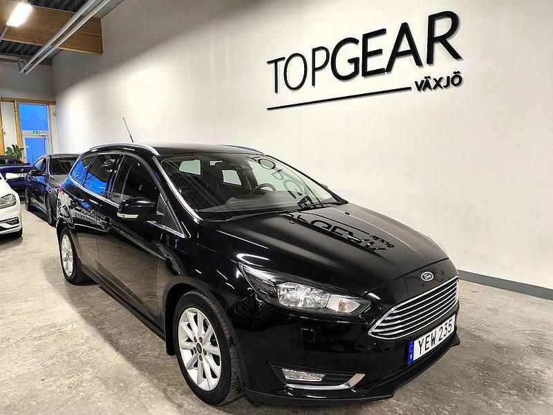 Svart Begagnad 2016 Ford Focus Titanium Kombi | 79 900 kr (Marknadspris) - Bild 1/4