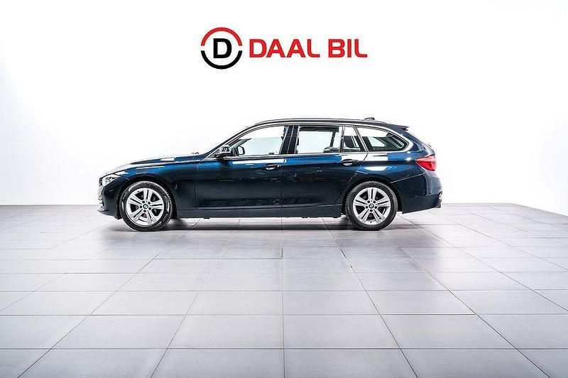 Blå Begagnad 2016 BMW 320 Sport Line Kombi | 159 700 kr (Bra pris) - Bild 1/4