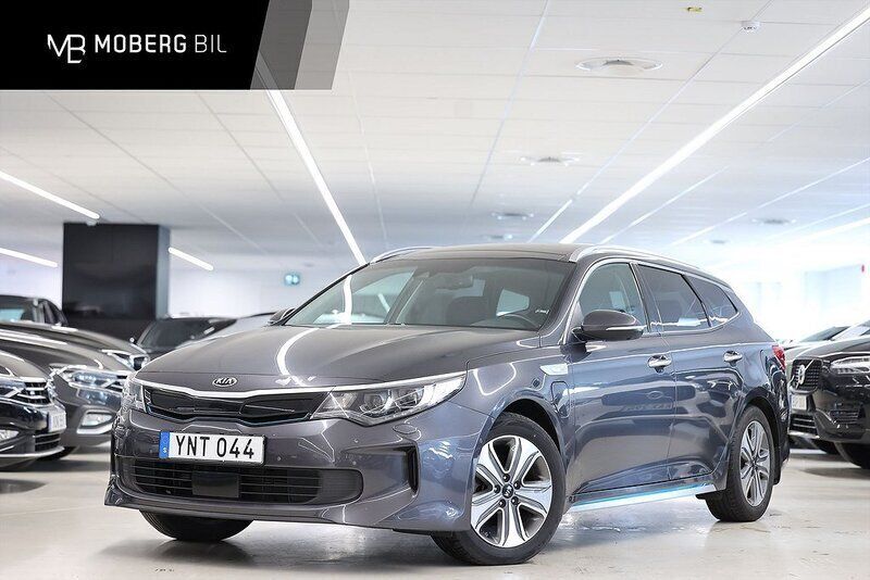 Grå Begagnad 2018 Kia Optima Hybrid 2 Sedan | 189 900 kr (Marknadspris) - Bild 1/3
