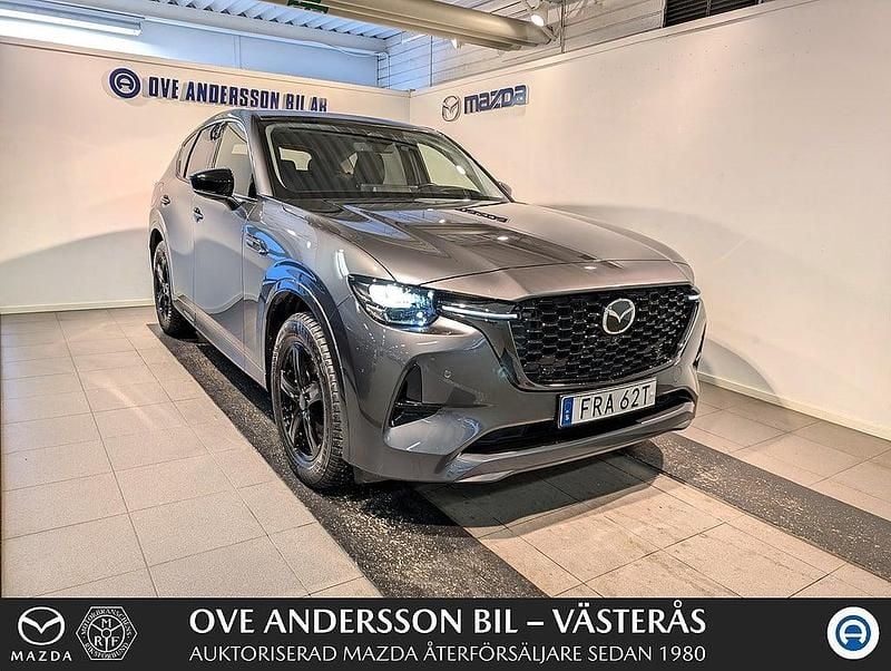 Grå Begagnad 2024 Mazda CX-60 Homura-Line SUV | 499 900 kr (Bra pris) - Bild 1/4