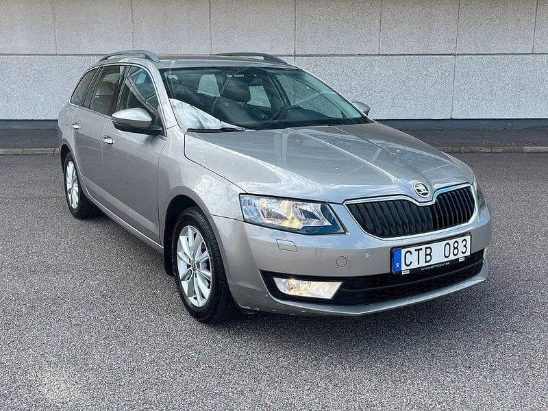 Ljusbrun (brun) Begagnad 2014 Skoda Octavia Ambition Kombi | 129 899 kr (Lite dyr) - Bild 1/4