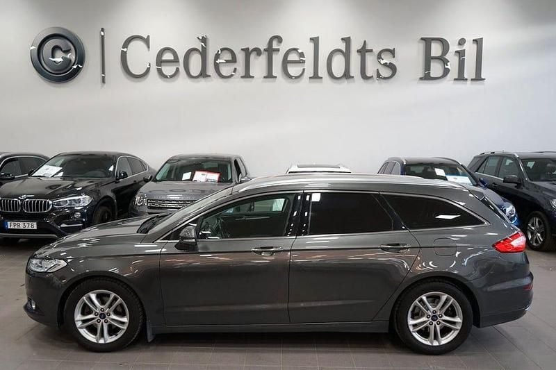 Grå Begagnad 2015 Ford Mondeo Titanium Kombi | 129 900 kr (Marknadspris) - Bild 1/4