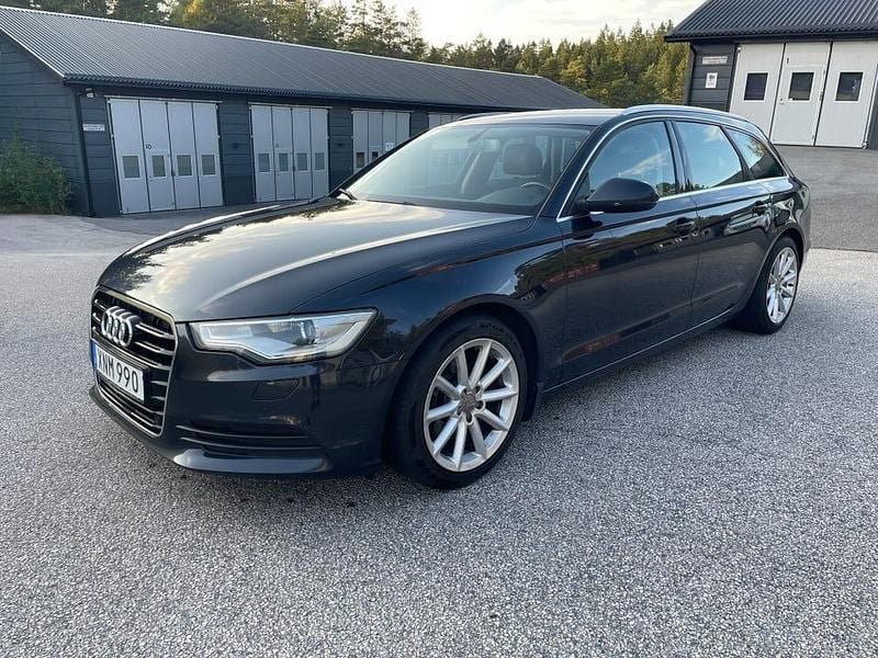 Blå/svart Begagnad 2014 Audi A6 Kombi | 135 000 kr (Marknadspris) - Bild 1/4