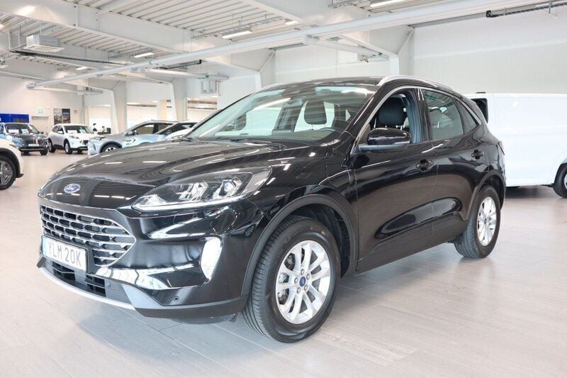 Svart (svart metallic) Begagnad 2021 Ford Kuga Titanium SUV | 269 800 kr (Marknadspris) - Bild 1/4