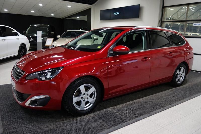 Ljusröd (röd) Begagnad 2017 Peugeot 308 Allure Kombi | 129 000 kr (Marknadspris) - Bild 1/4
