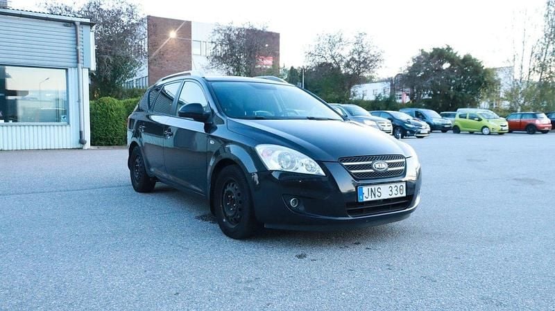 Svart Begagnad 2009 Kia Ceed Sportswagon EX Kombi | 54 700 kr (Marknadspris) - Bild 1/4