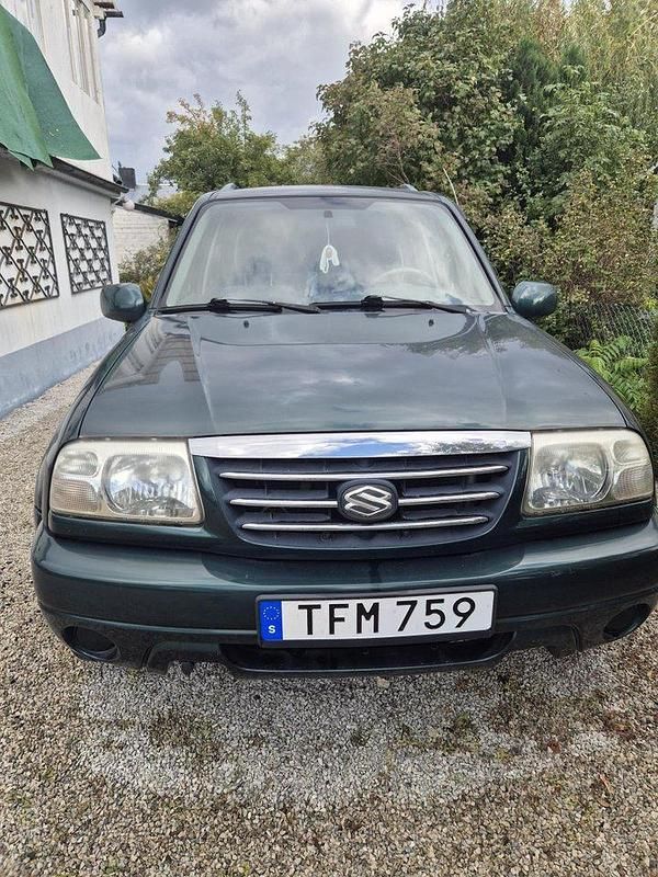 Grön Begagnad 2002 Suzuki Grand Vitara SUV | 40 000 kr (Marknadspris) - Bild 1/4