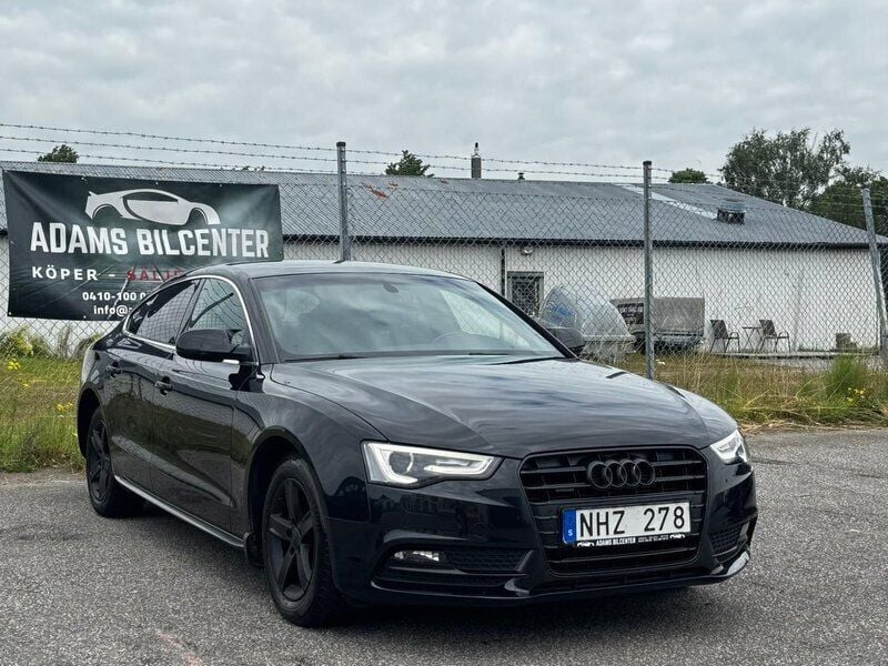 Svart Begagnad 2013 Audi A5 Sportback Comfort Halvkombi | 145 899 kr (Marknadspris) - Bild 1/4