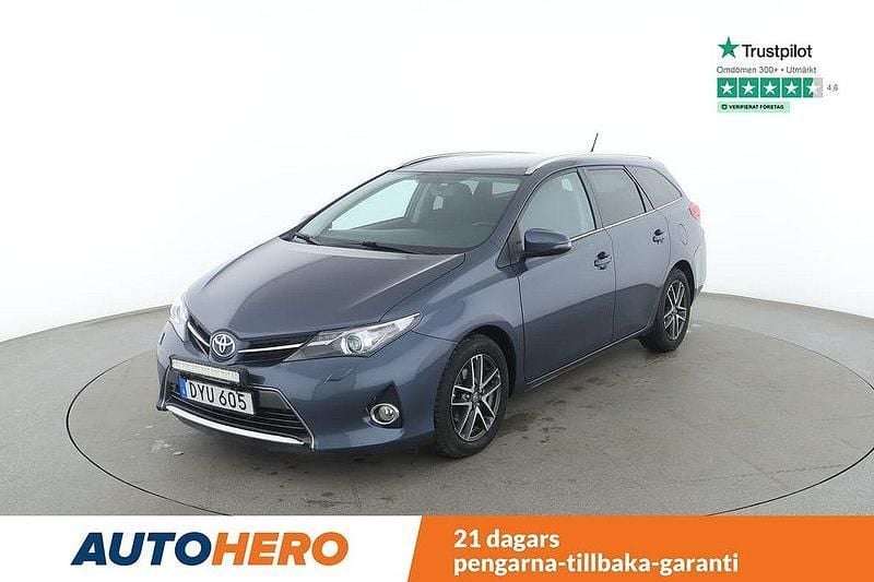 Mörkblå Begagnad 2014 Toyota Auris Touring Sports Kombi | 147 000 kr (Marknadspris) - Bild 1/4