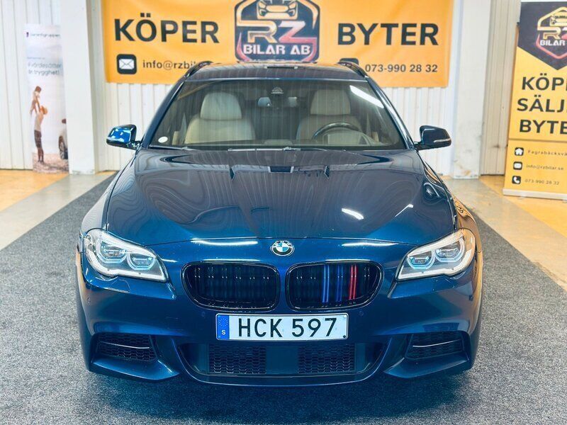 Blå Begagnad 2015 BMW 535 M Sport Kombi | 269 900 kr (Lite dyr) - Bild 1/4