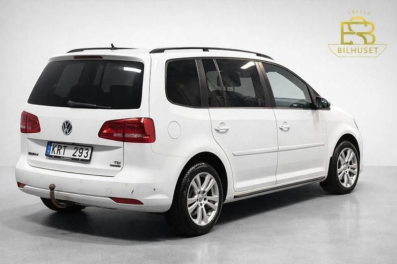 Begagnad VW Touran 105 HK (77 kW) 2014 Vit Minibuss