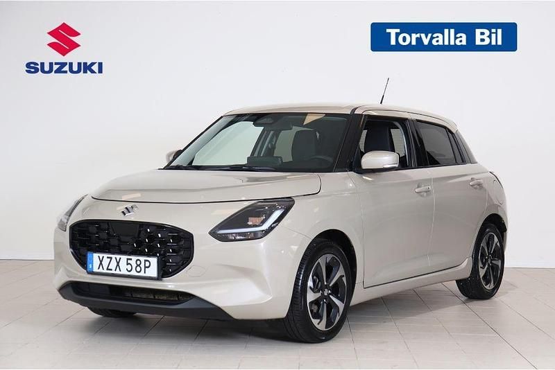 Brun Begagnad 2024 Suzuki Swift Halvkombi | 199 000 kr (Marknadspris) - Bild 1/4