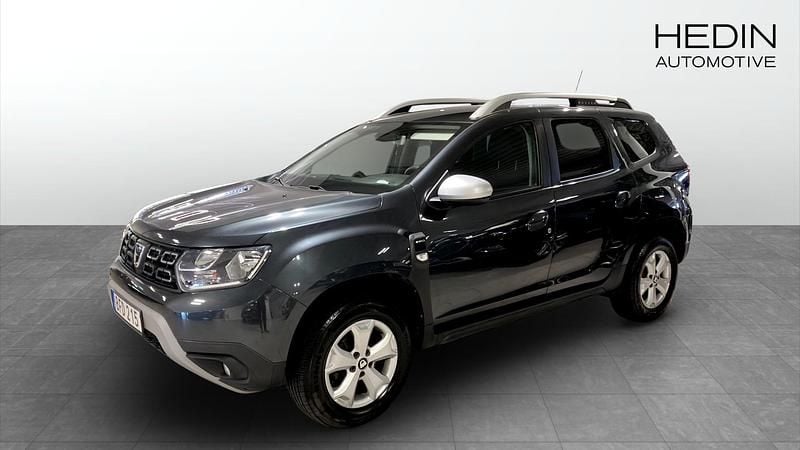 Mörkgrå (grey) Begagnad 2018 Dacia Duster Comfort SUV | 119 900 kr (Marknadspris) - Bild 1/4