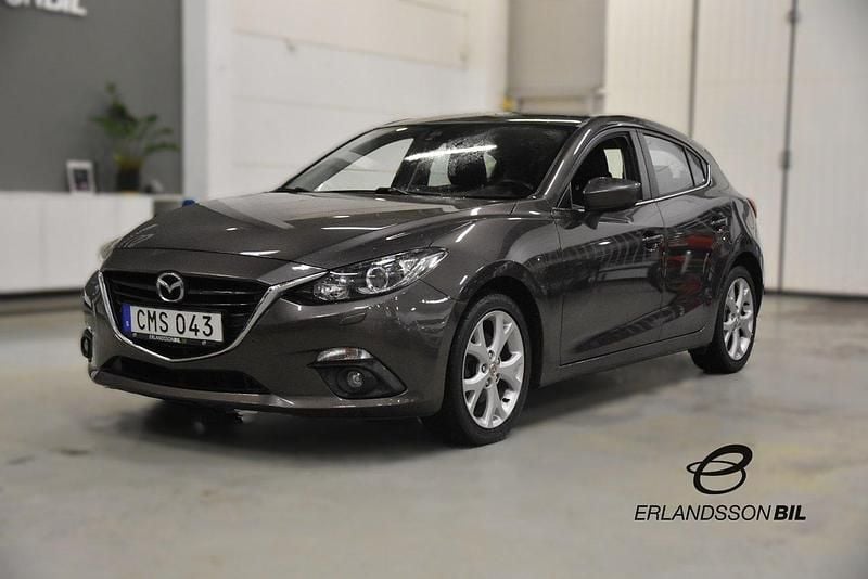Brun Begagnad 2015 Mazda 3 Inclusive Halvkombi | 137 900 kr (Marknadspris) - Bild 1/4