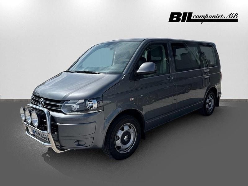 Grå Begagnad 2014 VW Caravelle Minibuss | 229 000 kr - Bild 1/4