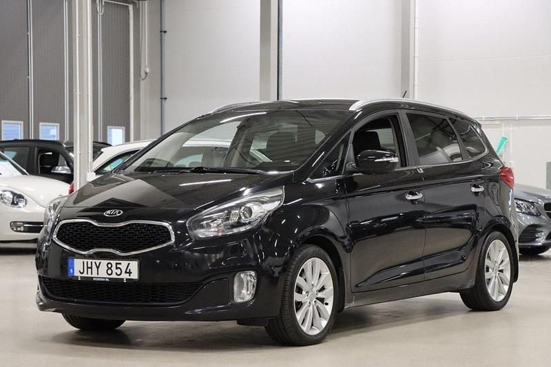 Svart Begagnad 2013 Kia Carens Minibuss | 74 900 kr (Marknadspris) - Bild 1/4