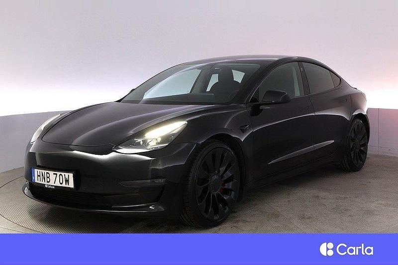 Svart Begagnad 2021 Tesla Model 3 Performance Sedan | 319 900 kr (Marknadspris) - Bild 1/4