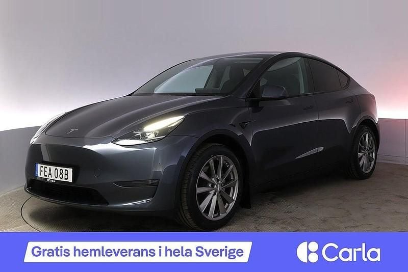 Begagnad Tesla Model Y Long Range AWD 378 kW (514 HK) 2023 Grå SUV