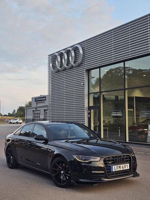 Svart Begagnad 2011 Audi A6 S-Line Sedan | 139 000 kr (Marknadspris) - Bild 1/4