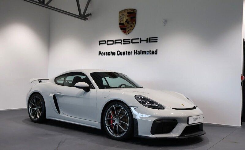 Grå Begagnad 2022 Porsche 718 Cayman GT4 Sportkupé | 1 290 000 kr (Bra pris) - Bild 1/4