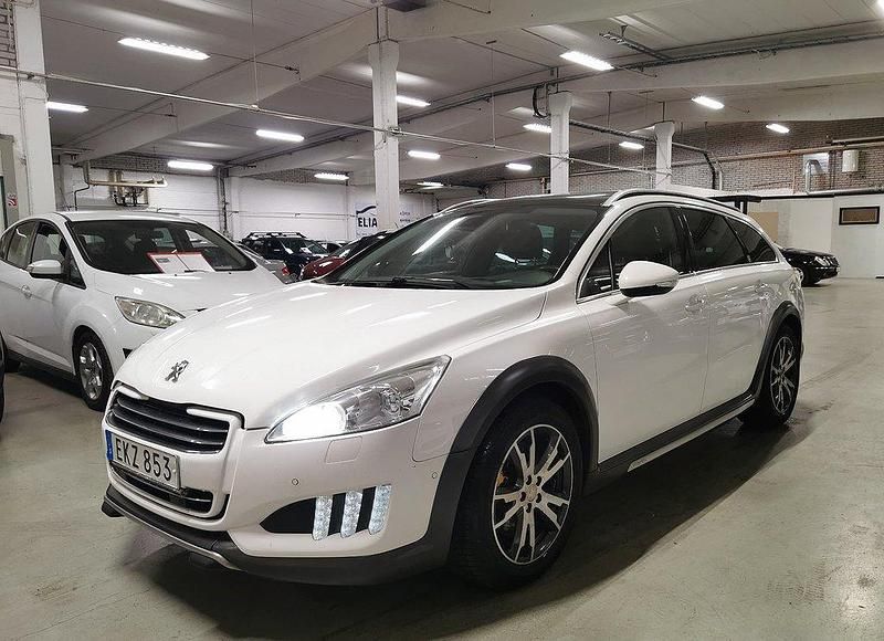 Vit Begagnad 2014 Peugeot 508 RXH Kombi | 99 900 kr - Bild 1/4